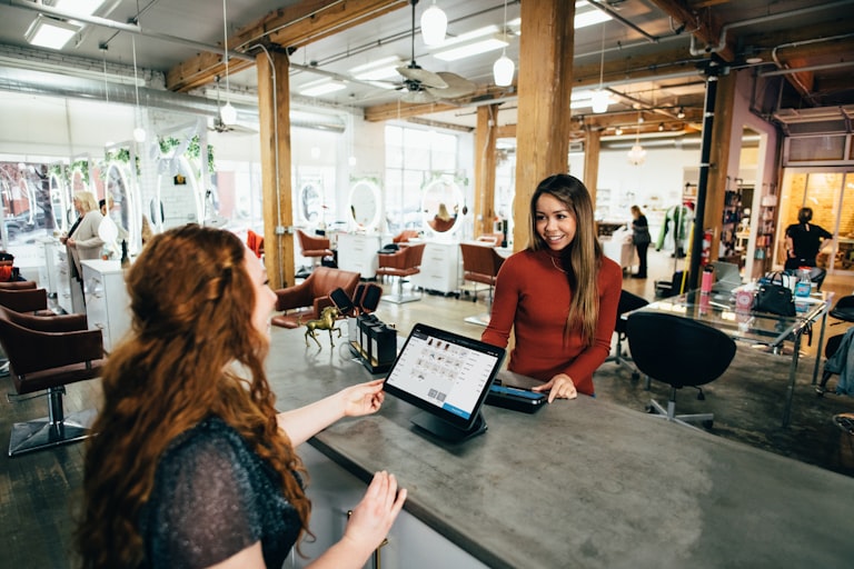 Small business owner helping a customer